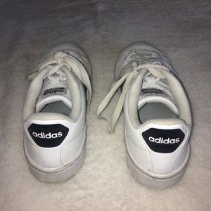 Adidas tennis shoes.